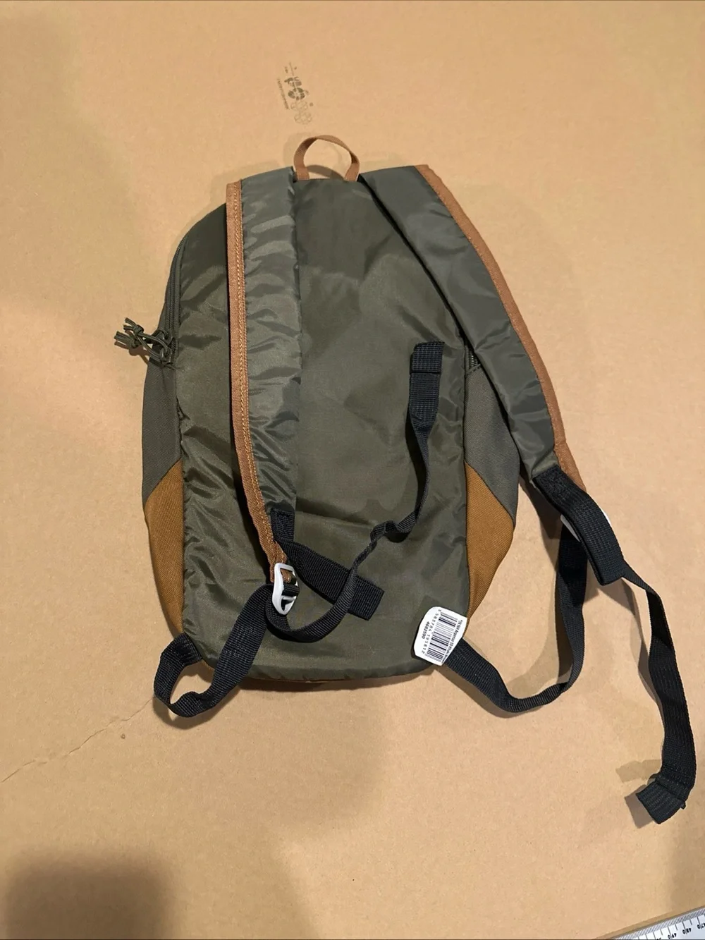 Quechua Green Backpack with Brown Base